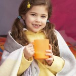 Girl Holding Cup of hot Cocoa